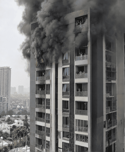High-rise building affected by heavy smoke and fire
